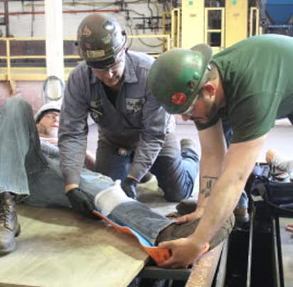 High Steel's First Aid team practices treating simulated shop related injuries in conjunction with our local EMS. 